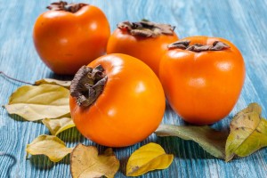 Persimmons on table