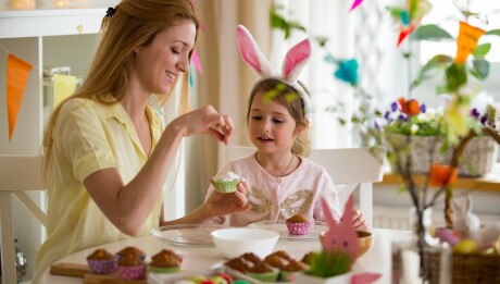Mother,And,Daughter,Celebrating,Easter,,Cooking,Cupcakes,,Covering,With,Glaze.