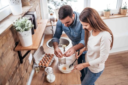 Couple,Cooking,Together,At,Home.,High,Angle,Image.