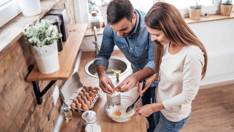 Couple,Cooking,Together,At,Home.,High,Angle,Image.